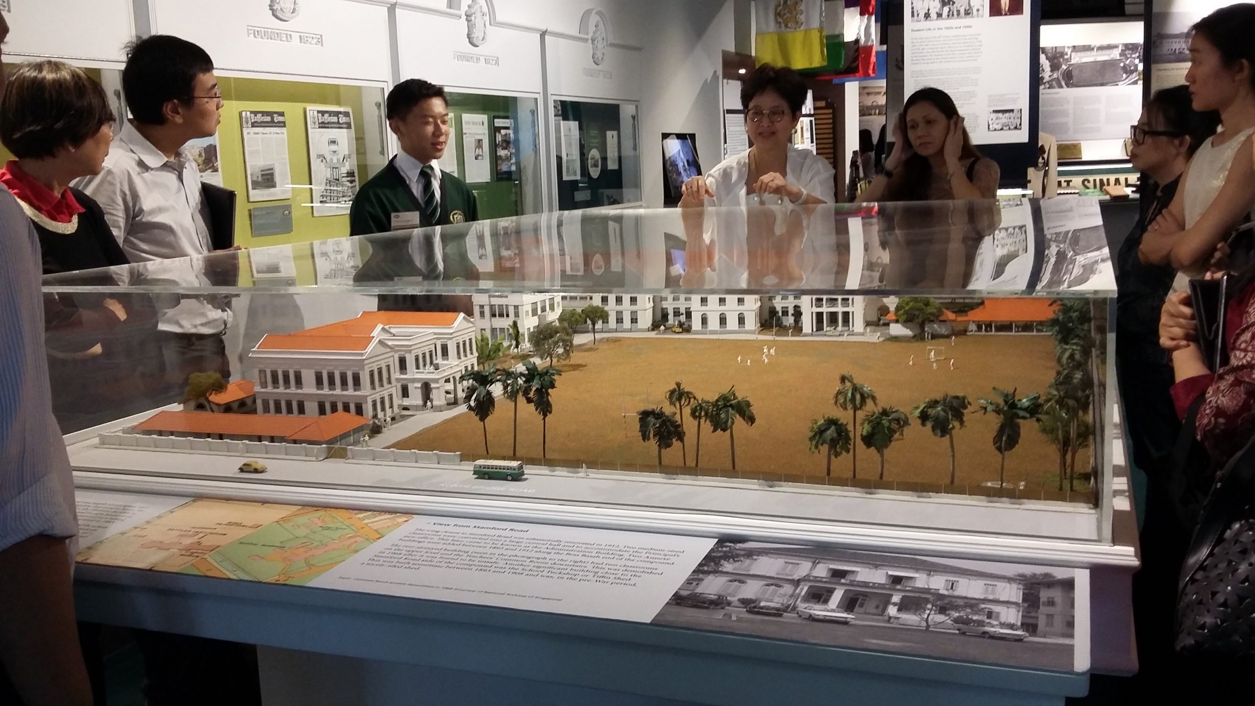 Mrs Cheryl Yap (4th from left) sharing the milestones of the RI history curated at RAM.